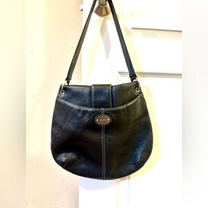 Franco Sarto Black Leather Shoulder Bag with snap front and pocket in back.